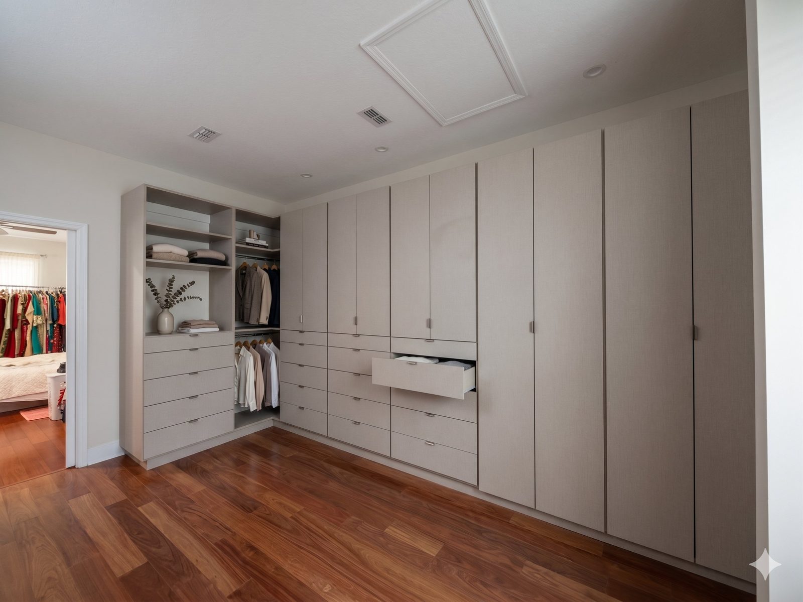 Custom walk-in closet with warm LED lighting by Karino
