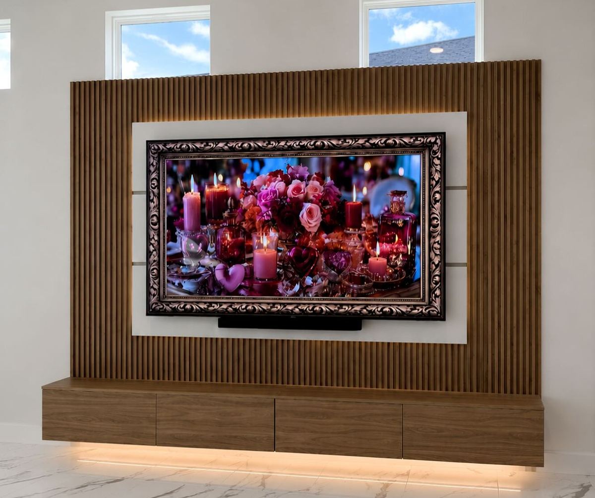 TV feature wall in marble and slat walnut with concealed lighting